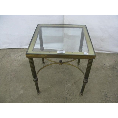 488 - Brass lamp table, the square glass top standing on tapering fluted brass supports with stretchers - ... 