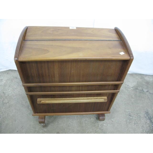 497 - Mid century drinks cabinet having a hinged lift top lid and fall front opening to a shelf and storag... 