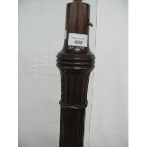 498 - Mahogany standard lamp having a turned and reeded column on a splayed tripod base - 45cm x 45cm x 14... 