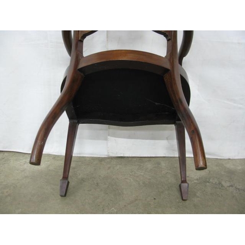 501 - Inlaid mahogany elbow chair having shaped pierced panel back, shaped arms and padded seat, standing ... 