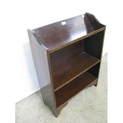 508 - Stained pine book trough having a book trough over a single shelf, standing on shaped supports - 61c... 