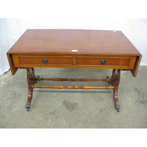 519 - Inlaid cross banded yew wood sofa table having two drawers with faux drawer fronts to reverse, stand... 