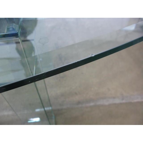 526 - Oval glass top dining table standing on two glass supports - 245cm x 108cm x 74cm tall (chips to edg... 