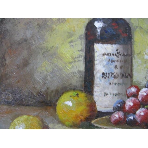 537 - Two oils on board, still life's of fruit and wine bottles, both unsigned - 39cm x 29cm each in gilt ... 