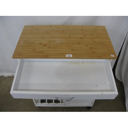 398 - Modern white kitchen island with three cupboards, a single drawer and a wine rack having pine top an... 