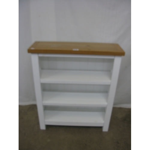 398 - Modern white kitchen island with three cupboards, a single drawer and a wine rack having pine top an... 