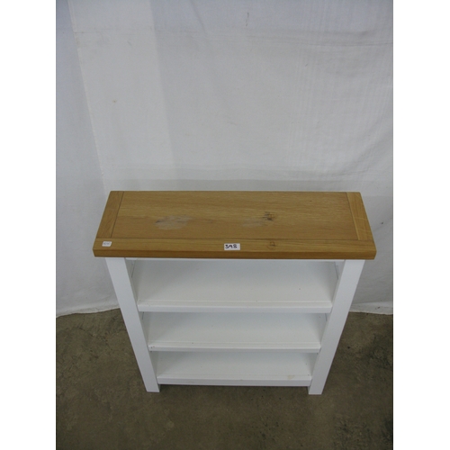 398 - Modern white kitchen island with three cupboards, a single drawer and a wine rack having pine top an... 