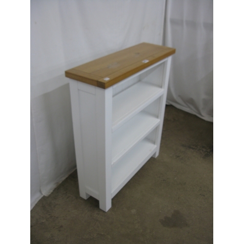 398 - Modern white kitchen island with three cupboards, a single drawer and a wine rack having pine top an... 