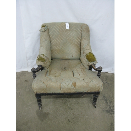 407 - 19th century armchair having padded and scrolled armrests supported on turned and tapering front leg... 