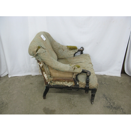 407 - 19th century armchair having padded and scrolled armrests supported on turned and tapering front leg... 