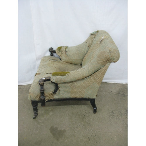 407 - 19th century armchair having padded and scrolled armrests supported on turned and tapering front leg... 