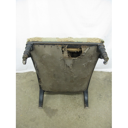 407 - 19th century armchair having padded and scrolled armrests supported on turned and tapering front leg... 