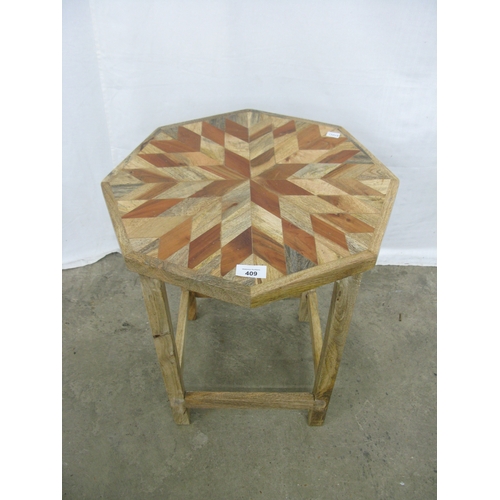 409 - Rustic octagonal parquetry top lamp table having square stretchered legs - 44cm x 44cm x 52.5cm tall... 