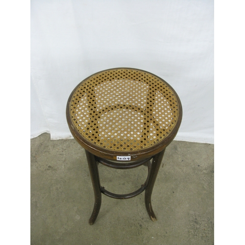 409 - Rustic octagonal parquetry top lamp table having square stretchered legs - 44cm x 44cm x 52.5cm tall... 