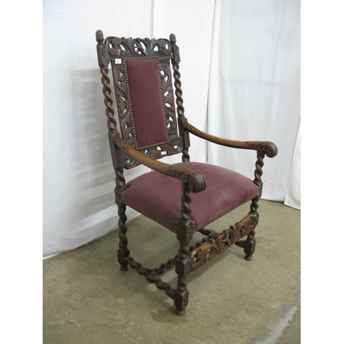 414 - Charles II walnut open armchair having padded back surmounted with putti and foliate carved framewor... 