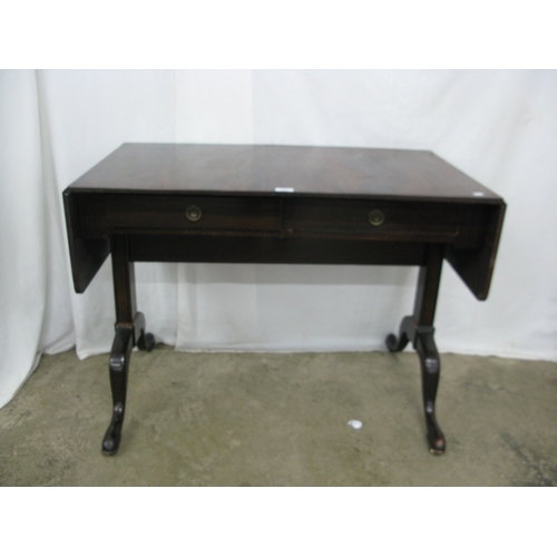 418 - Mahogany sofa table, the rectangular top with drop flap to each side having rounded corners over two... 