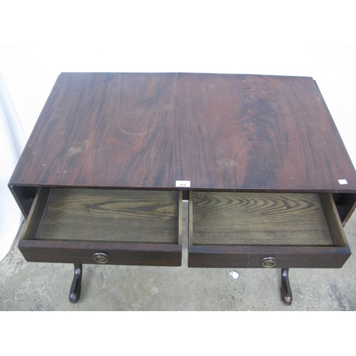 418 - Mahogany sofa table, the rectangular top with drop flap to each side having rounded corners over two... 
