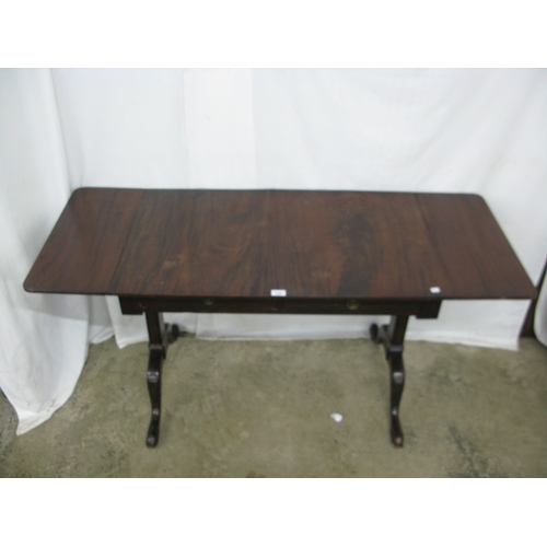 418 - Mahogany sofa table, the rectangular top with drop flap to each side having rounded corners over two... 
