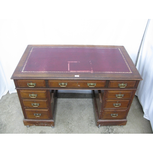420 - Mahogany twin pedestal desk having a red leather gilt tooled insert over three frieze drawers, stand... 
