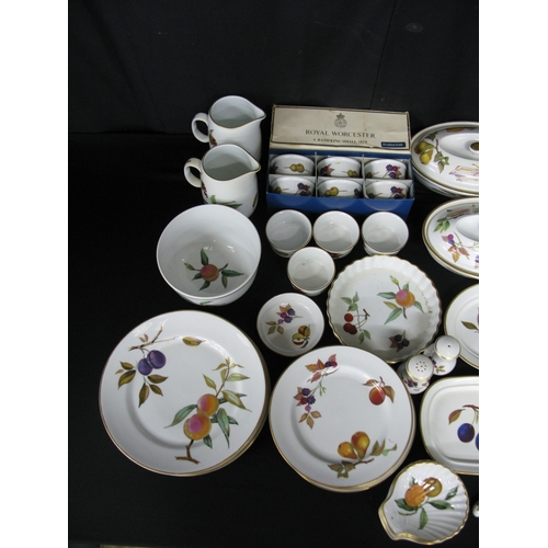 103 - Royal Worcester Evesham part tea and dinner ware to comprise: five mugs, two 14cm tall jugs, six box... 