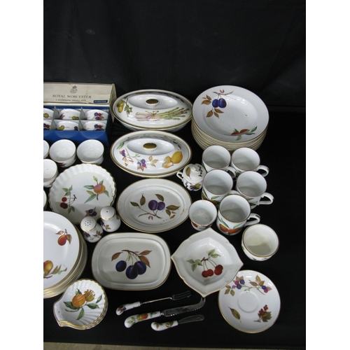103 - Royal Worcester Evesham part tea and dinner ware to comprise: five mugs, two 14cm tall jugs, six box... 