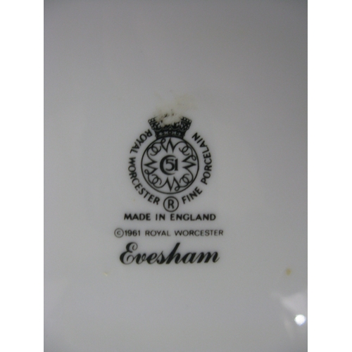 103 - Royal Worcester Evesham part tea and dinner ware to comprise: five mugs, two 14cm tall jugs, six box... 