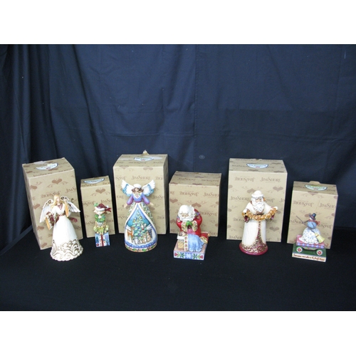 109 - Jim Shore Christmas themed figurines to comprise: ivory/gold Santa 4027799, Rejoice 4023458E, Christ... 