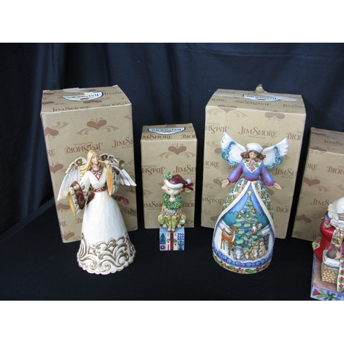 109 - Jim Shore Christmas themed figurines to comprise: ivory/gold Santa 4027799, Rejoice 4023458E, Christ... 