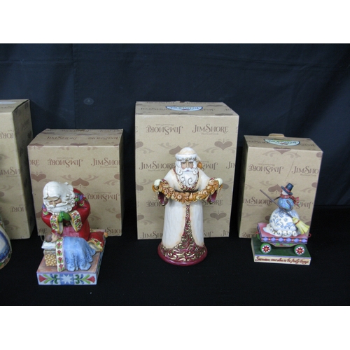 109 - Jim Shore Christmas themed figurines to comprise: ivory/gold Santa 4027799, Rejoice 4023458E, Christ... 