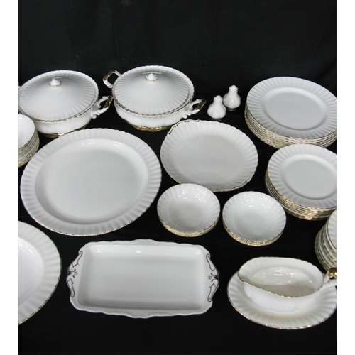 114 - Royal Albert Val D'or part tea and dinner ware to comprise: seven tea cups, eight 14.5cm saucers, si... 