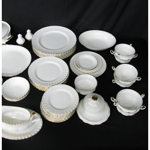 114 - Royal Albert Val D'or part tea and dinner ware to comprise: seven tea cups, eight 14.5cm saucers, si... 