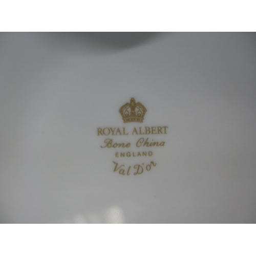 114 - Royal Albert Val D'or part tea and dinner ware to comprise: seven tea cups, eight 14.5cm saucers, si... 