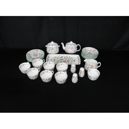 115 - Minton Haddon Hall part tea and dinner ware to comprise: six tea cups, seven 14.5cm saucers, six 16c... 