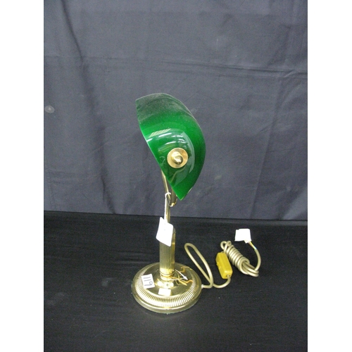 119 - Mid 20th century teak and brass table lamp together with a brass and green glass shade desk lamp