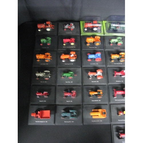 73 - Fifty boxed and unboxed Hatchette Parkwork tractors to include: Japp agricole - 1962 and McCormick C... 