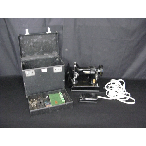 75 - Singer 221-1 portable electric sewing machine with case and fitted tray with accessories and manual ... 