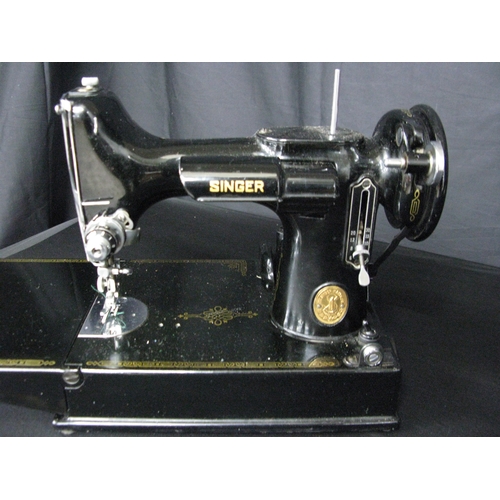 75 - Singer 221-1 portable electric sewing machine with case and fitted tray with accessories and manual ... 