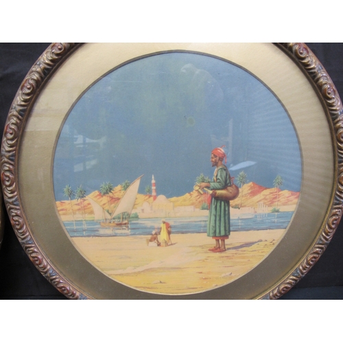 85 - Two circular prints by Victor E Pickup depicting Egypt - 29cm dia in glazed circular gilt frames