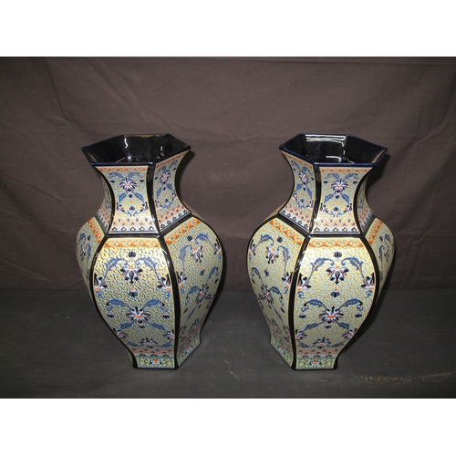 89 - Pair of Decor Exclusiv porcelain vases of hexagonal shape with colourful raised hand painted and flo... 