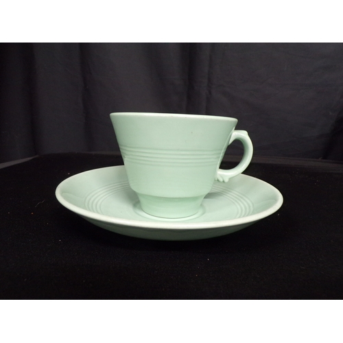 113 - Wood's Ware Beryl mint green part tea and dinner ware to comprise: ten 10cm cups, five 9cm cups, fou... 