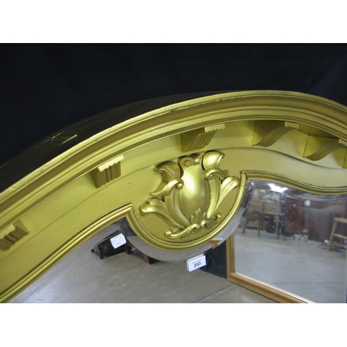 253 - Modern gilt frame over mantle mirror with arched top and bevelled glass - 128cm x 102cm. Together wi... 
