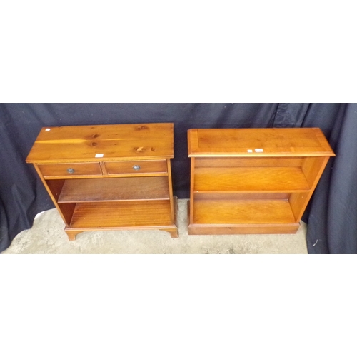 258 - Reproduction yew wood bookcase having two drawers over single adjustable shelf, standing on splayed ... 