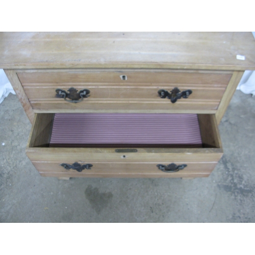 249 - Satinwood dressing chest having a moulded top bevel edge mirror over a bow fronted shelf above three... 