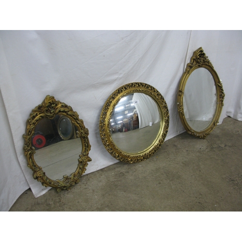 241 - Group of three gilt framed mirrors to comprise: ornate oval gilt framed mirror - 37cm x 57cm, convex... 