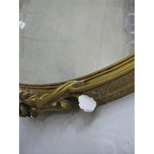 241 - Group of three gilt framed mirrors to comprise: ornate oval gilt framed mirror - 37cm x 57cm, convex... 