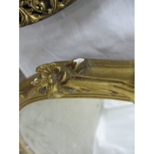 241 - Group of three gilt framed mirrors to comprise: ornate oval gilt framed mirror - 37cm x 57cm, convex... 