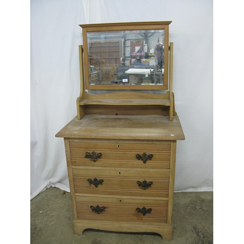 249 - Satinwood dressing chest having a moulded top bevel edge mirror over a bow fronted shelf above three... 