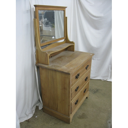 249 - Satinwood dressing chest having a moulded top bevel edge mirror over a bow fronted shelf above three... 