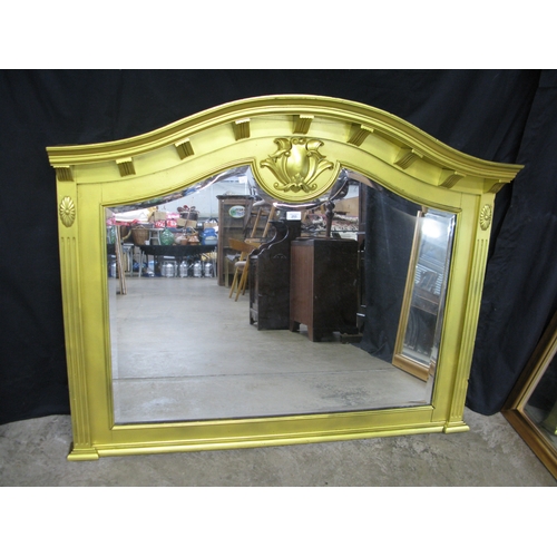 253 - Modern gilt frame over mantle mirror with arched top and bevelled glass - 128cm x 102cm. Together wi... 