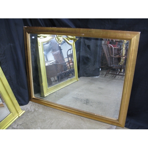 253 - Modern gilt frame over mantle mirror with arched top and bevelled glass - 128cm x 102cm. Together wi... 